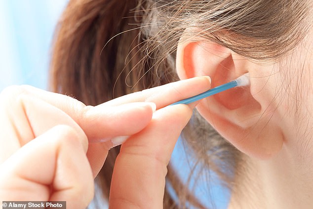 Many people know the satisfaction of using a cotton bud to clean your ears but the little tools, also known by the brand name Q-tips, may do more harm than good (file photo)