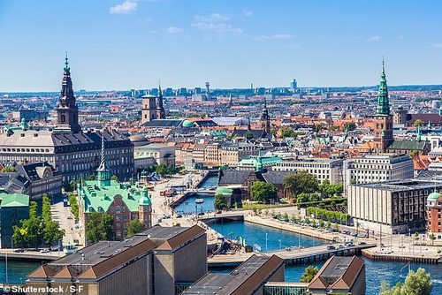 Eight of the ten happiest nations were found in Europe, with Denmark scooping second place, at 7.58 points. Pictured, Copenhagen, Denmark