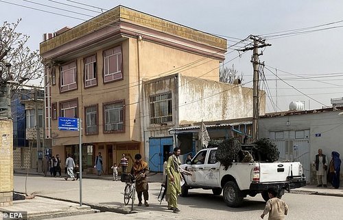 War-scarred Afghanistan and Lebanon remain the two unhappiest countries in the survey, retaining bottom spots, with average life evaluations more than five points lower than in the ten happiest countries. Pictured above, Mazar-e-Sharif, provincial capital of Balkh province, Afghanistan