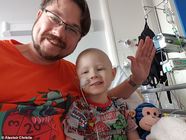 Alastair Christie, pictured with his son Gideon, stopped working completely for 18 months while the youngster underwent cancer therapy