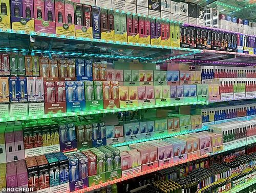The brightly coloured displays are seen in shops on Oxford Street labelled as toy, sweet and gift shops