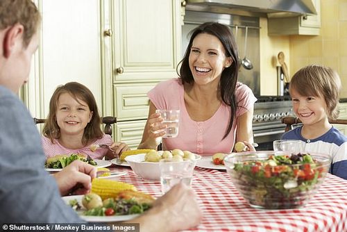 Another, obvious way to help your child eat well is to be a role model yourself ¿ young kids will want what they see you having (stock image)