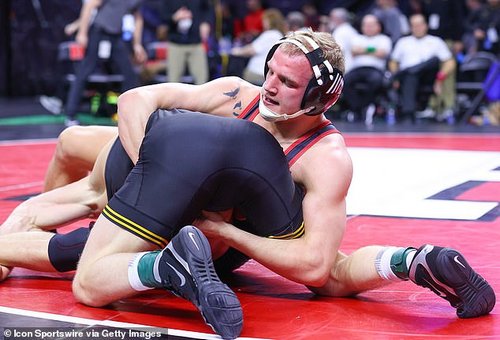 Mr Robb, pictured above at the Big Ten Championships on March 7, 2020, said that a bruise on his leg emerged in March during another wrestling competition